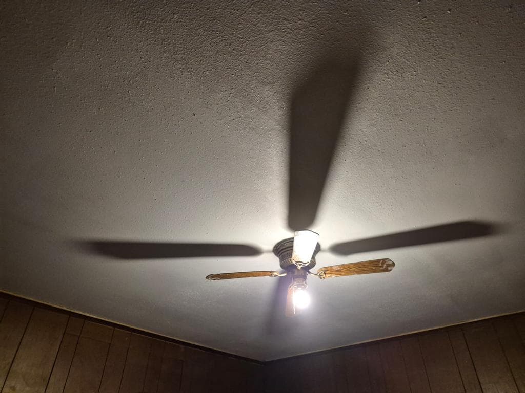 After - completed ceiling repair with smooth textured finish